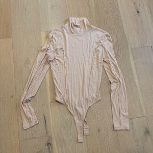 Out From Under beige bodysuit